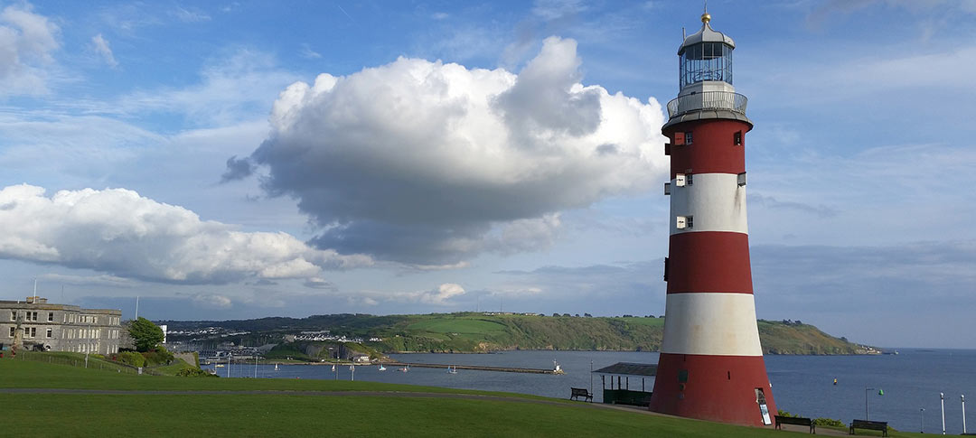 Red and white striped Smeaton's Tower lighthouse on Plymouth Hoe